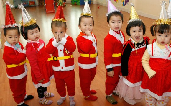 Children dressed in Santa