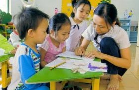 young ones and instructor during the SOS Nursery class Hanoi Vietnam