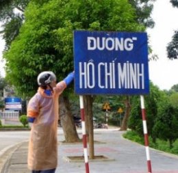 The sign says: Ho Chi Minh Road