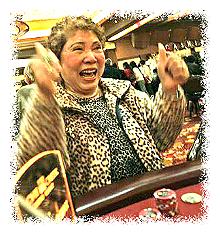 Vietnamese American woman betting in a casino © B